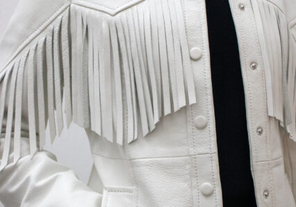 Ganni white leather jacket with fringes - close up