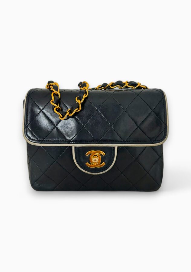 Chanel Classic Navy Mini Flap Bag - The Collectives Amsterdam - rent and buy secondhand and vintage designer clothes