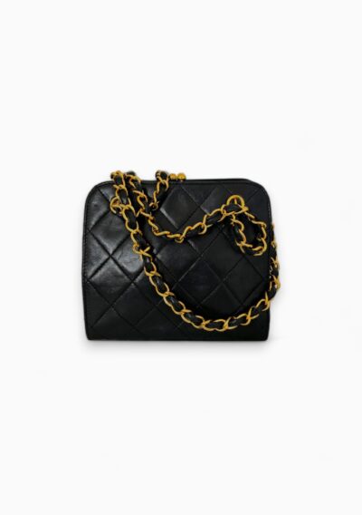 Chanel Kisslock Mini Bag - The Collectives Amsterdam - rent and buy secondhand and vintage designer clothes