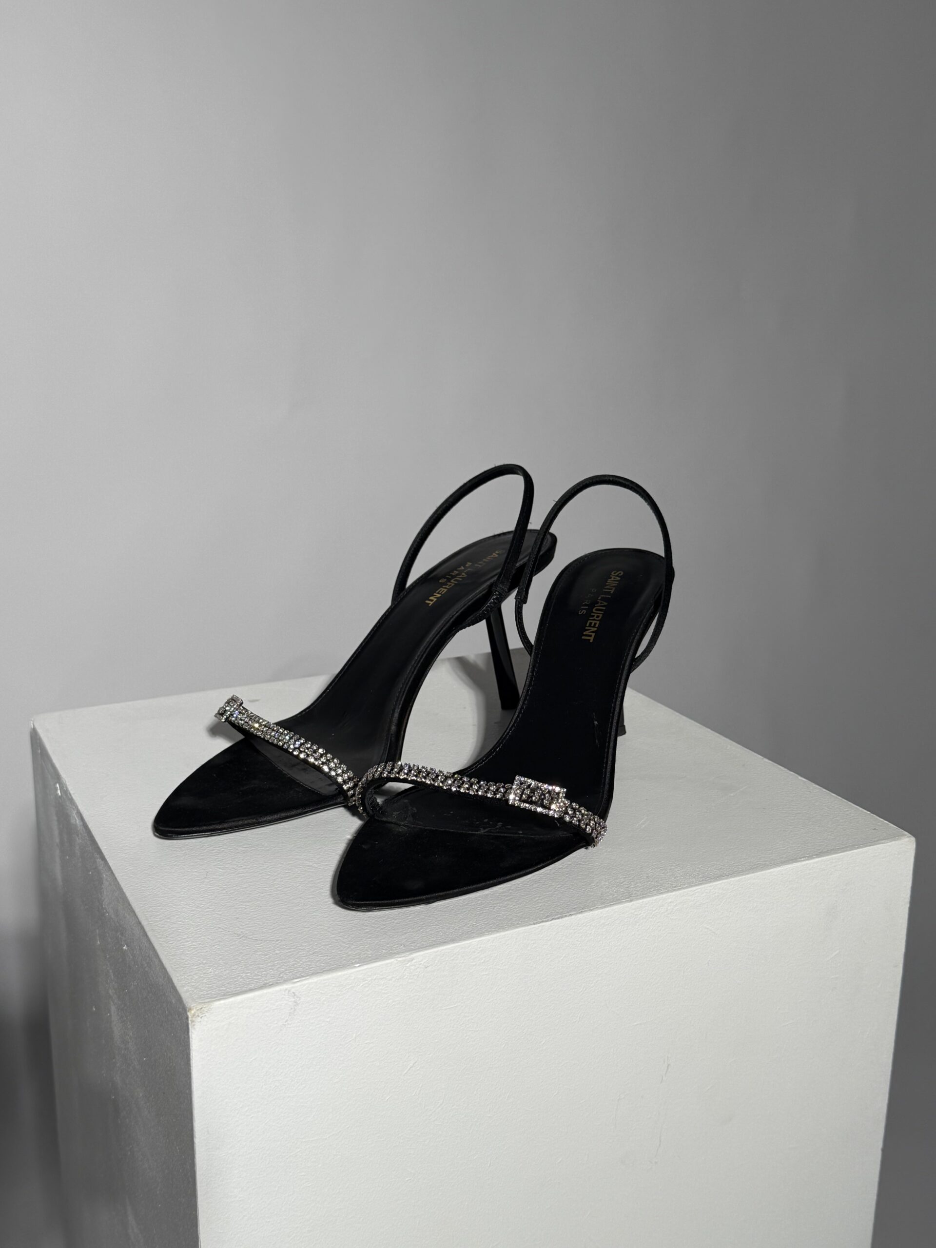 Black rhinestone strap pumps