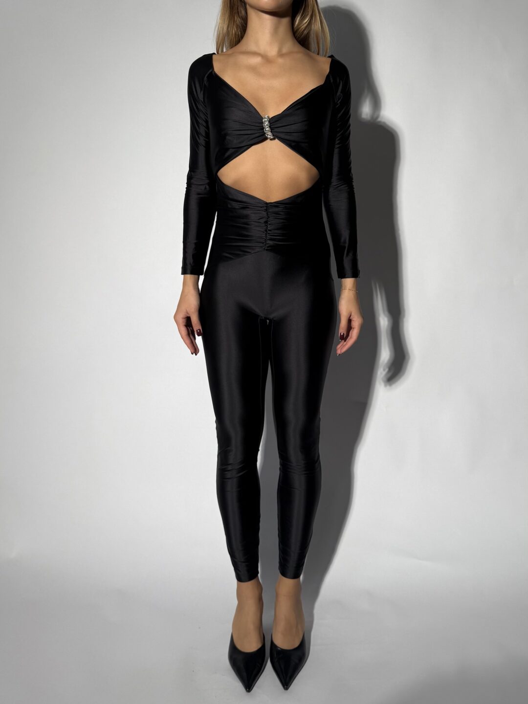 Shiny fitted jumpsuit with silver details